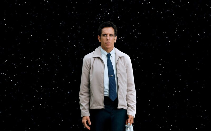 Man in jacket against starry background