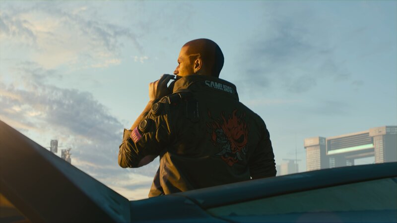 Man in Jacket on Rooftop