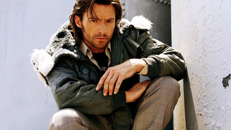 Man in Jacket Sitting