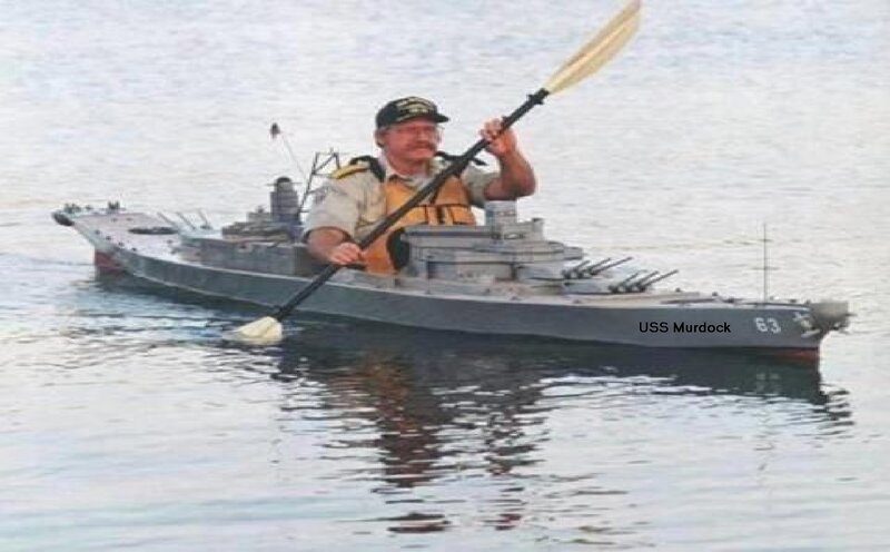 Man in Kayak with Ship