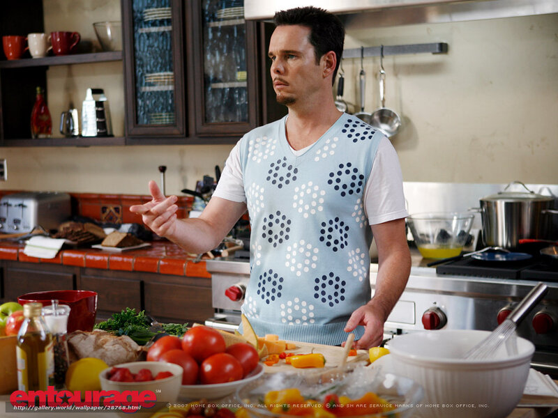 man in kitchen preparing food