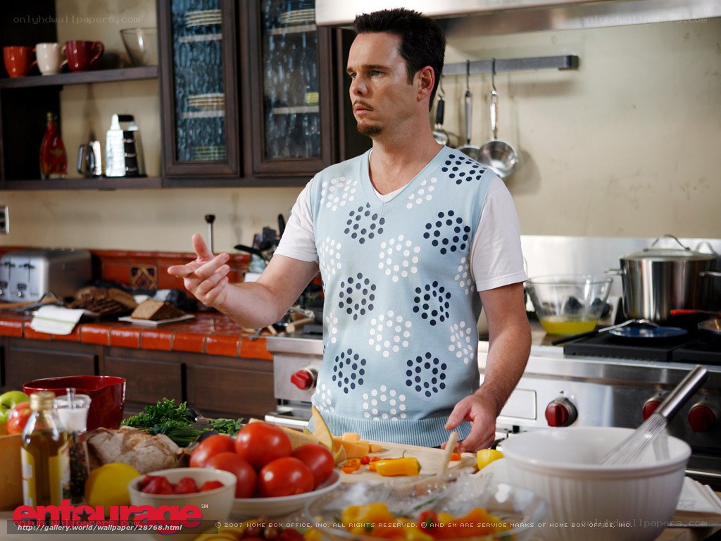 man in kitchen preparing food