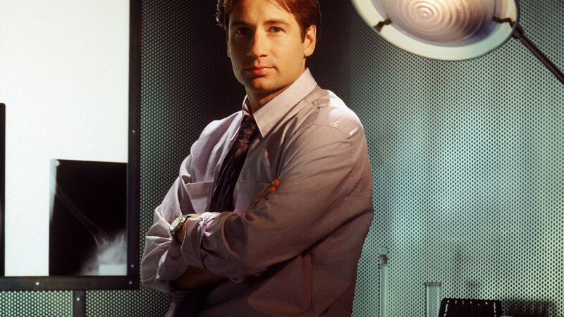 man in lab coat standing