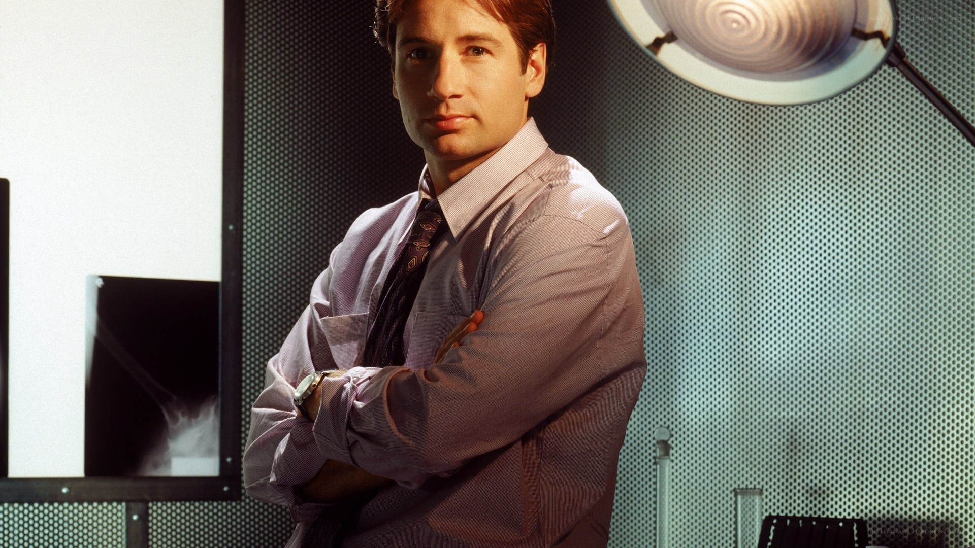 man in lab coat standing