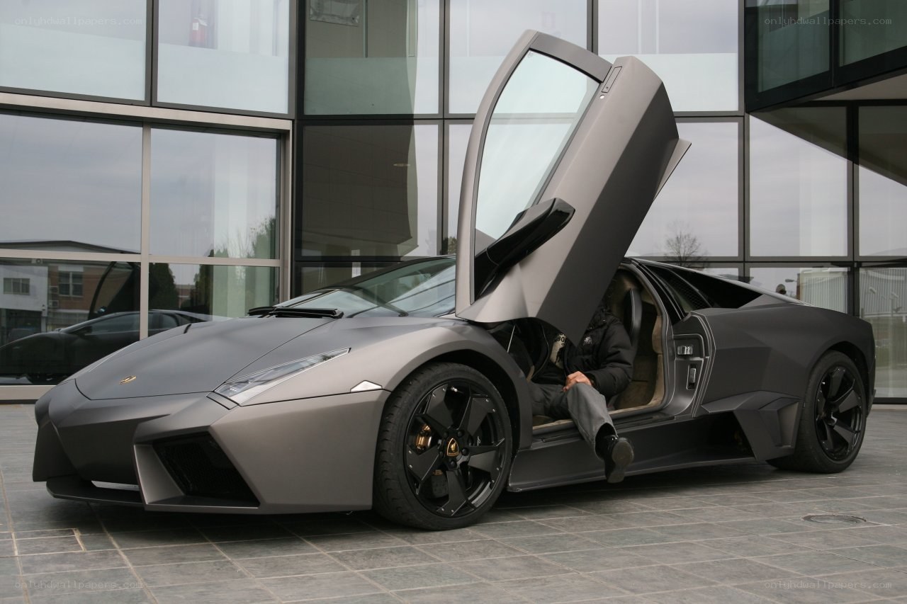 Man in Lamborghini with door open