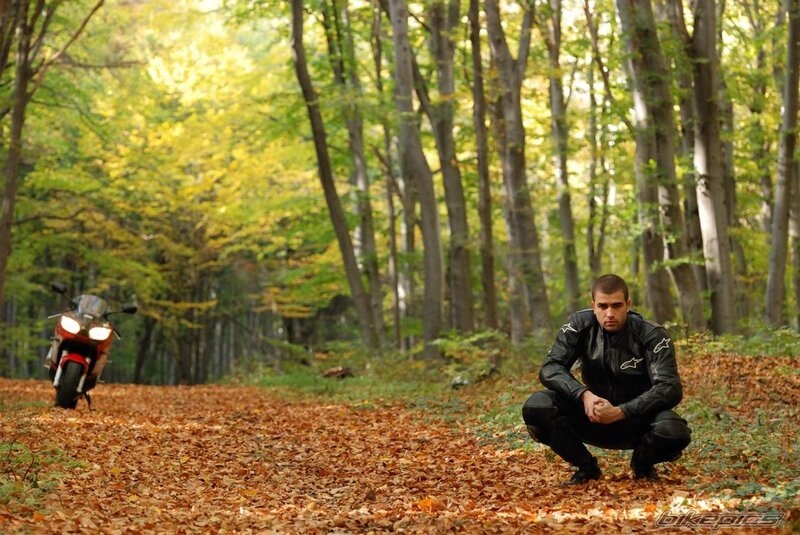 Man in leather gear with motorcycle