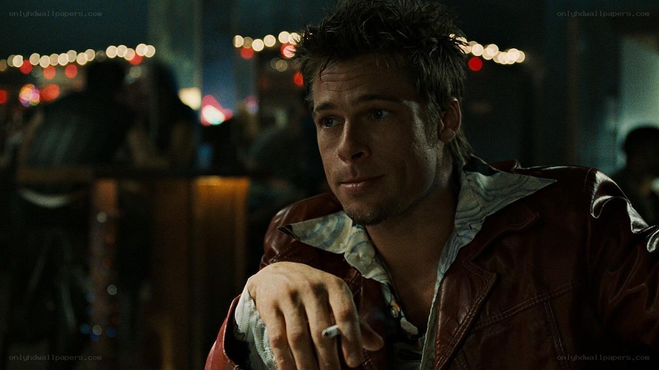 man in leather jacket at bar