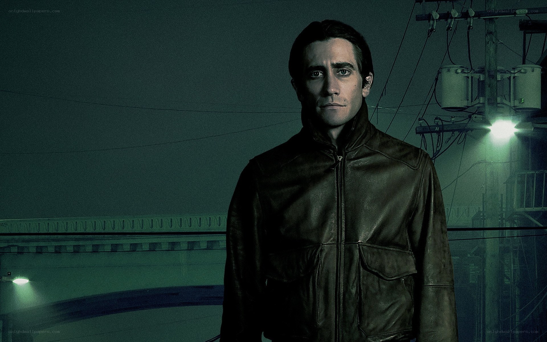 man in leather jacket at night