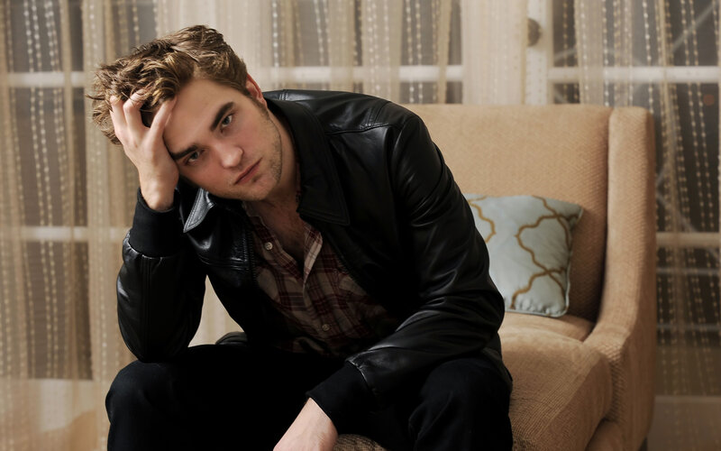 Man in Leather Jacket — Black, Contemplative, Photograph, Armchair, Pillow