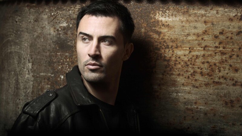 Man in Leather Jacket — Black, Dramatic, Photograph, Leather Jacket, Rusty Wall