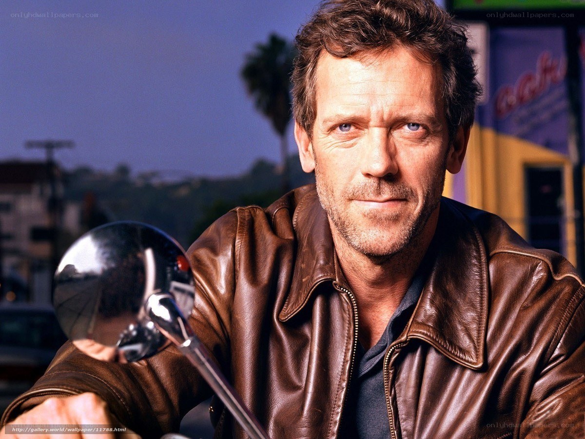 man in leather jacket on motorcycle