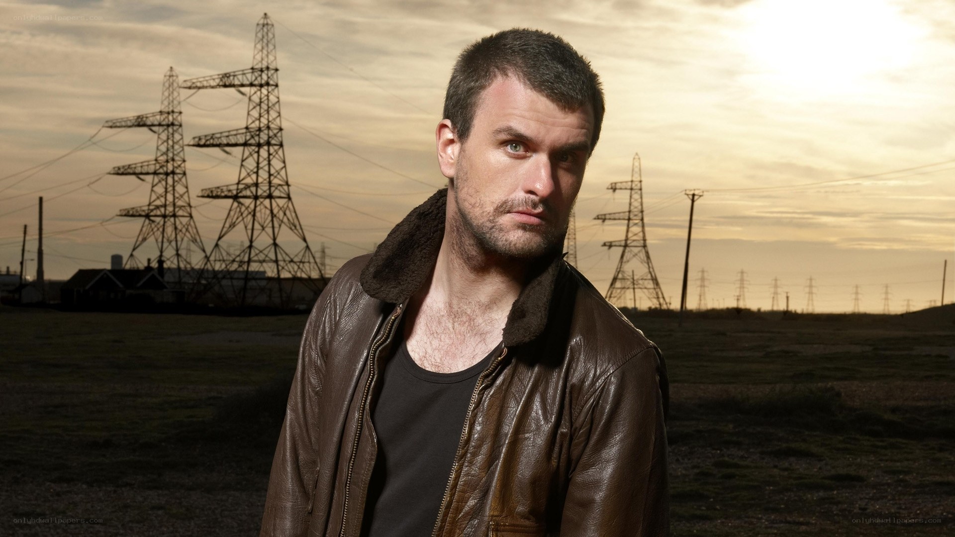 man in leather jacket outdoors