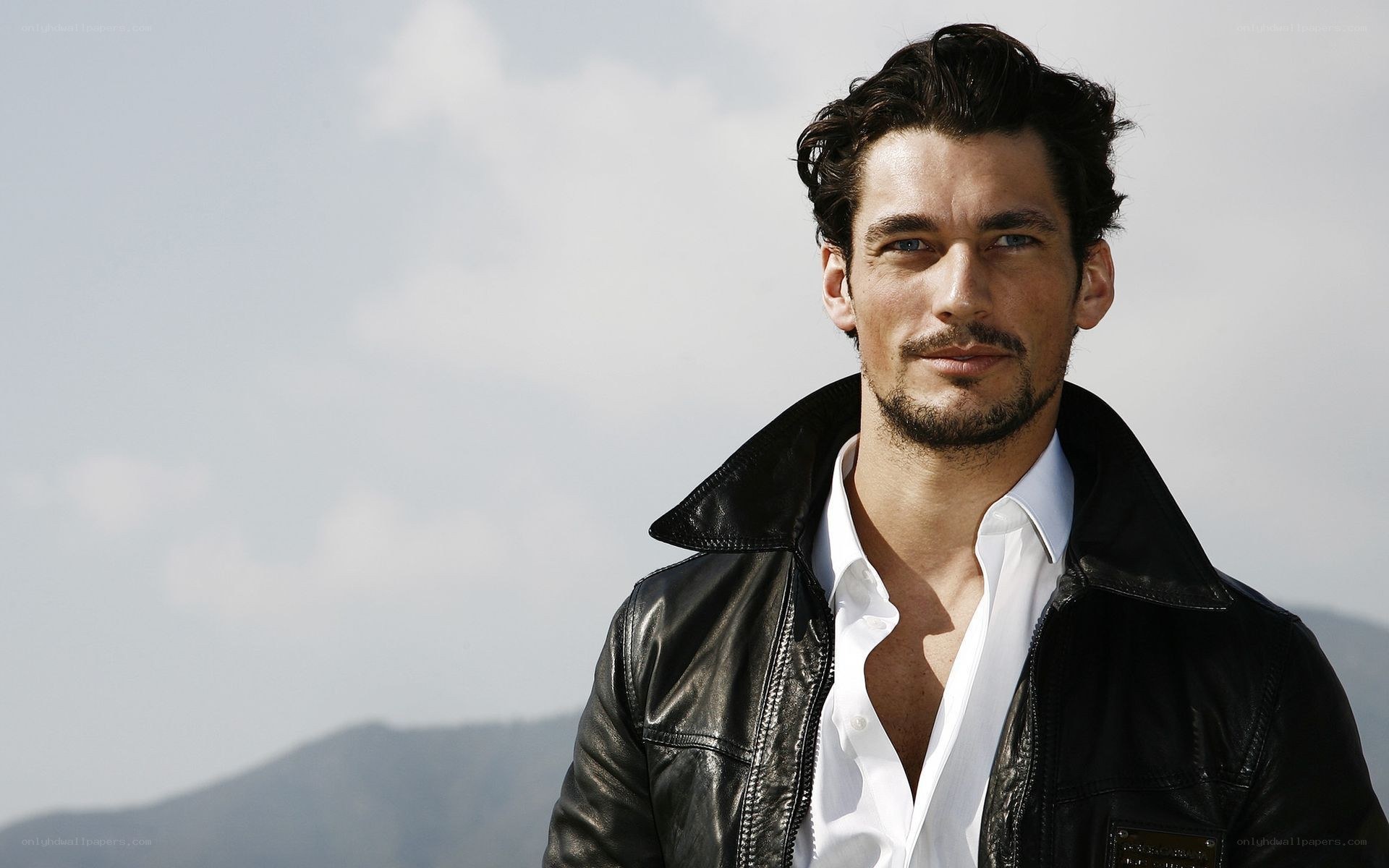 man in leather jacket outdoors