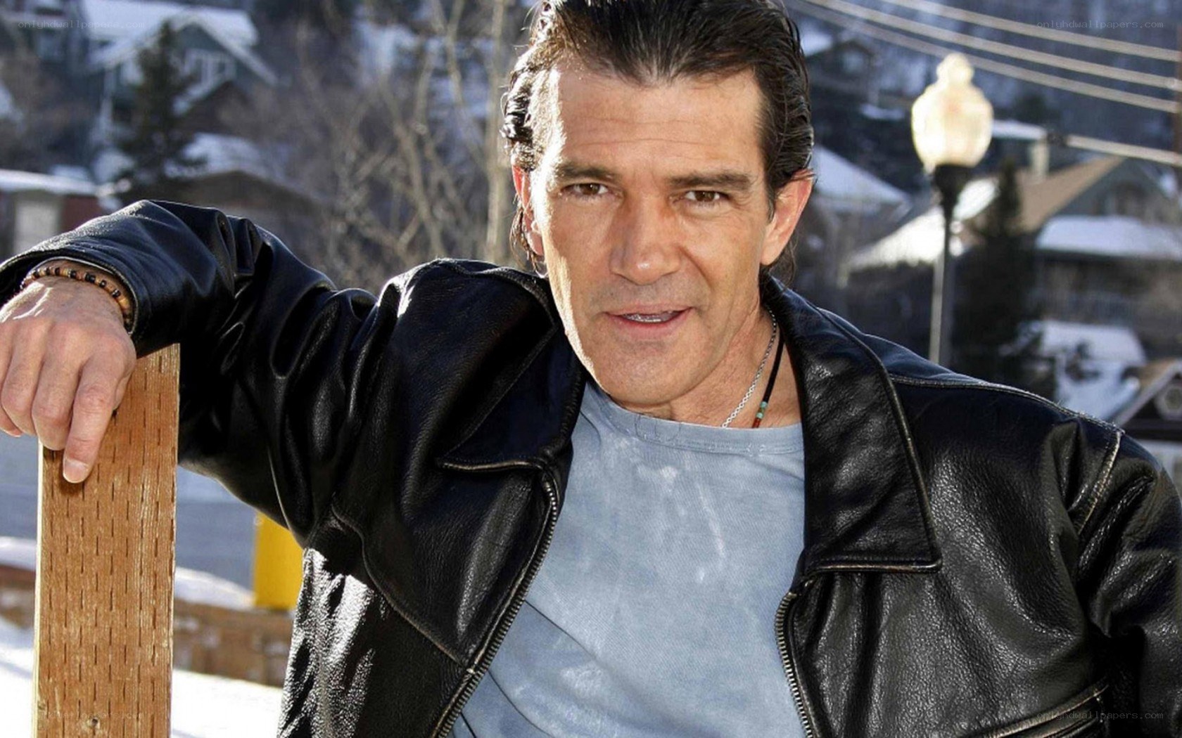 man in leather jacket outdoors