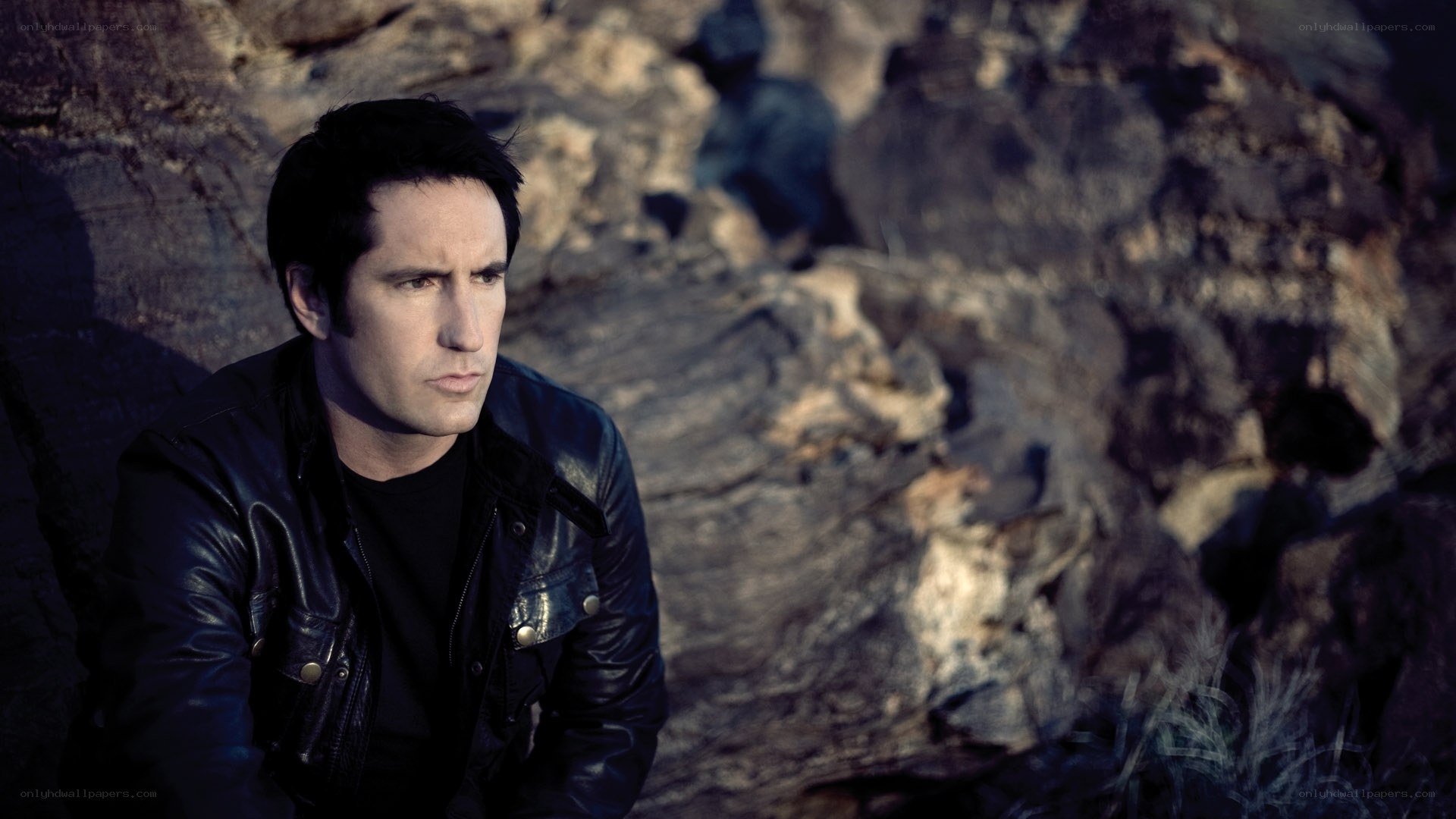man in leather jacket outdoors
