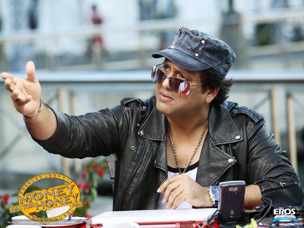 Man in leather jacket pointing