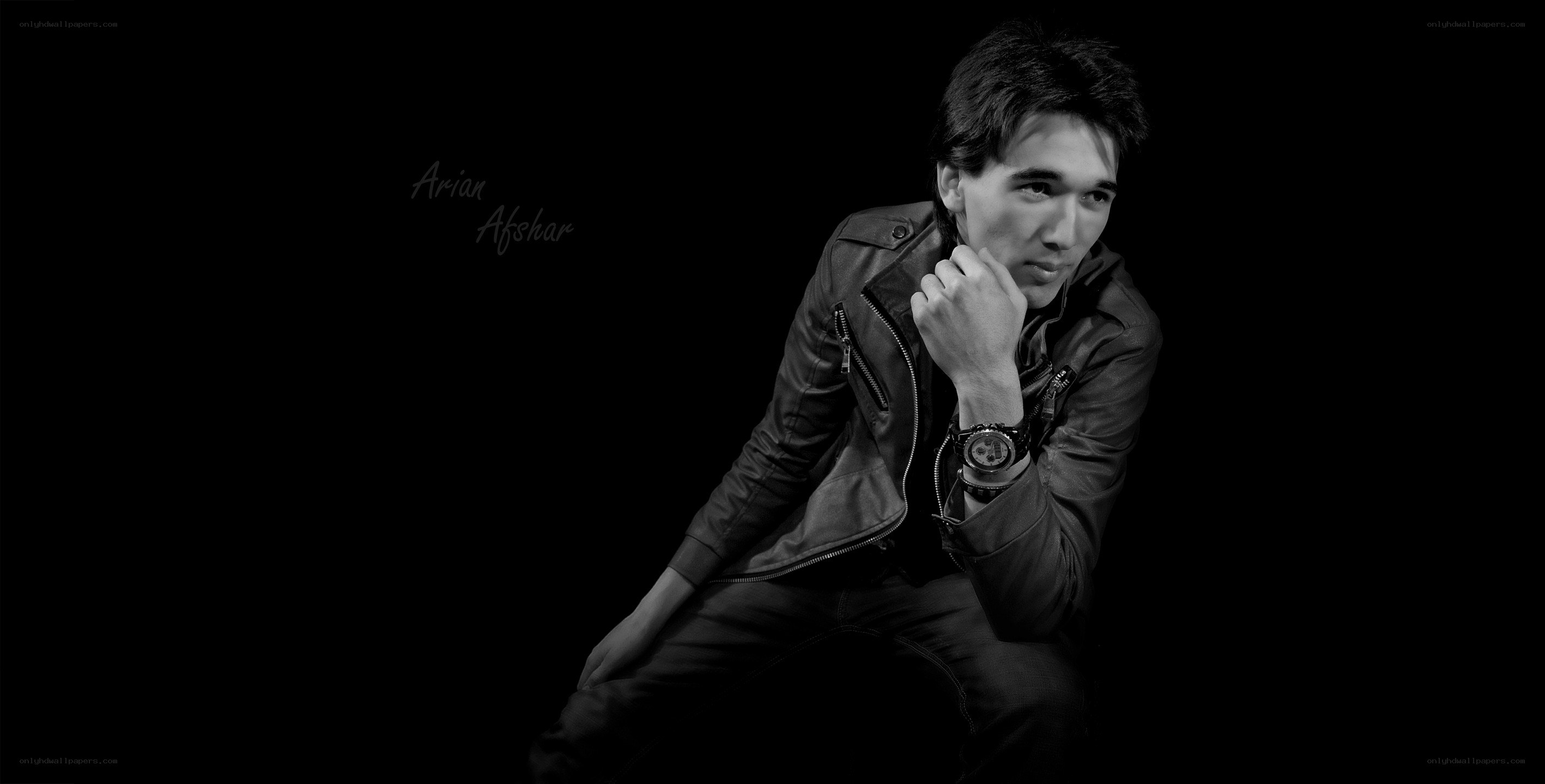 man in leather jacket posing