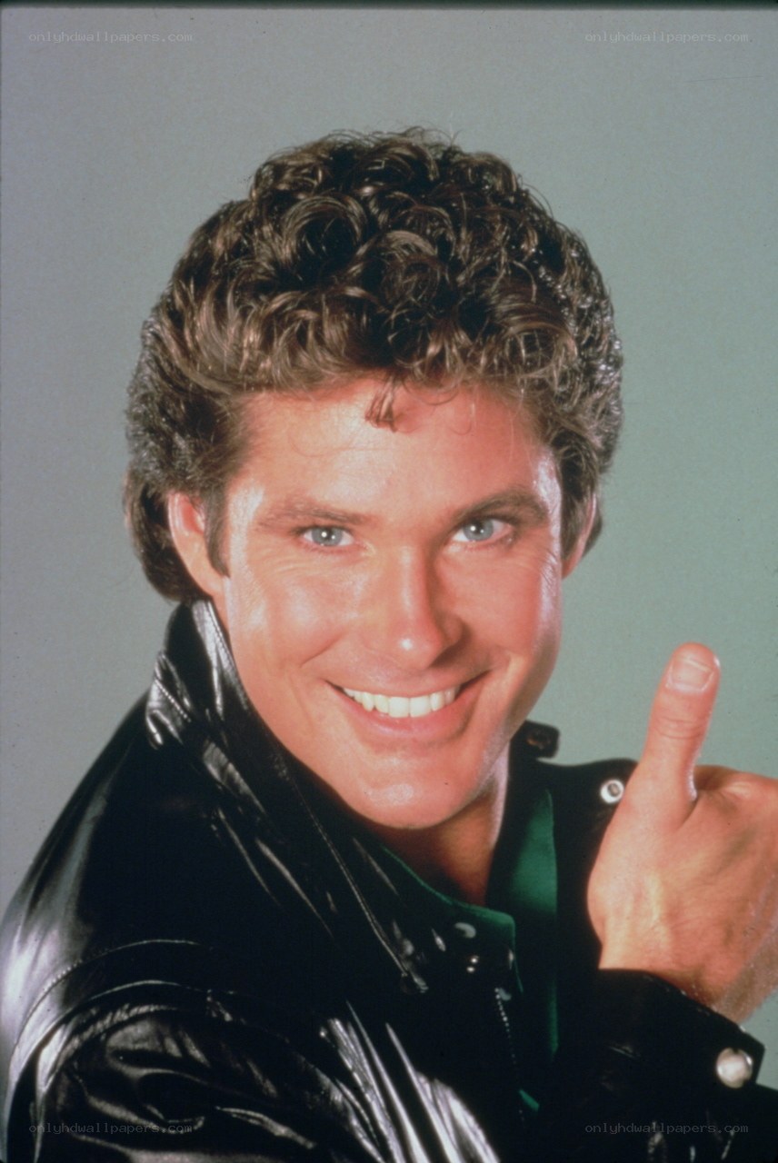 man in leather jacket smiling