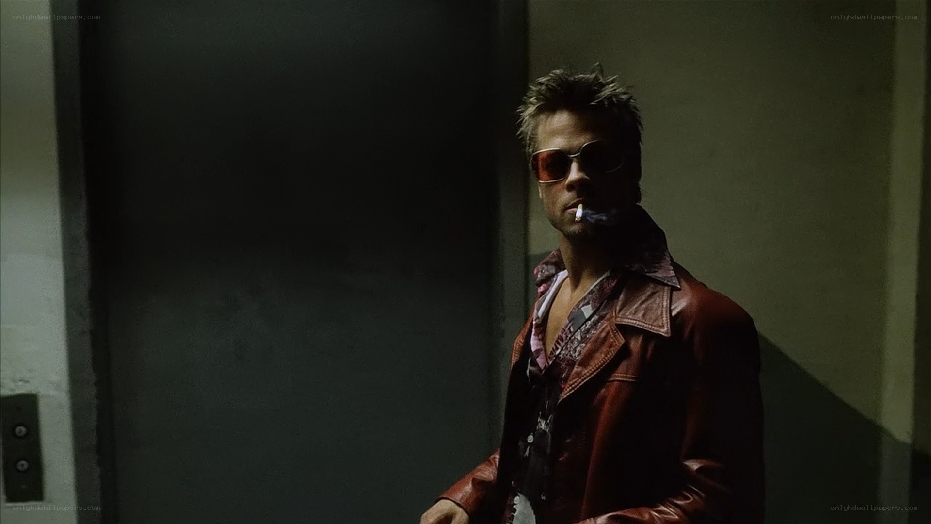 man in leather jacket smoking