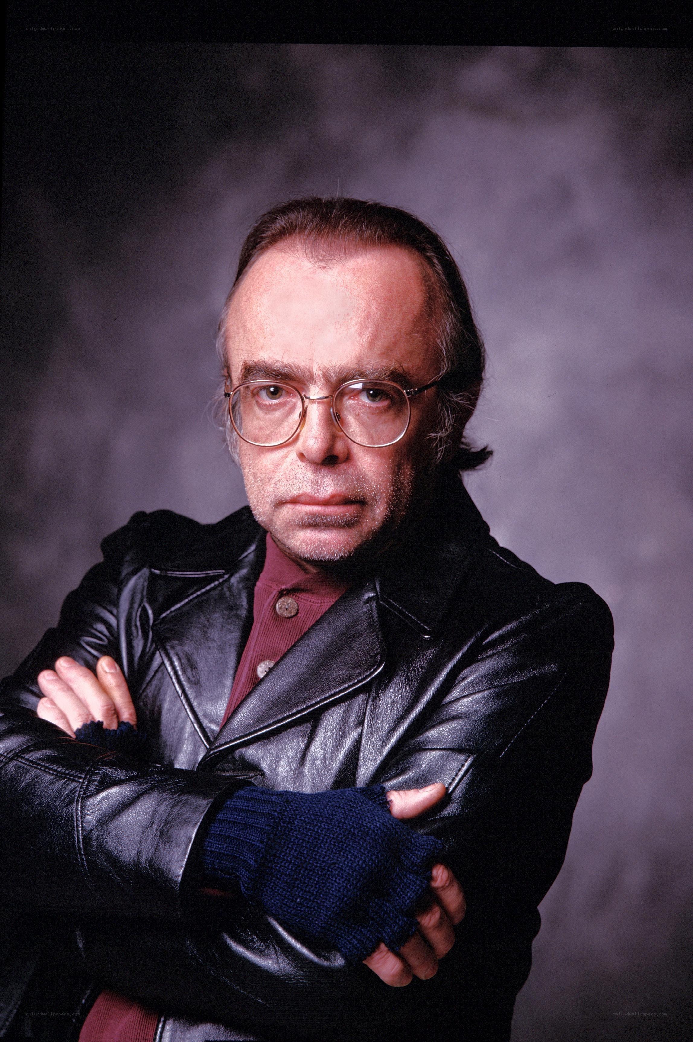 man in leather jacket with glasses