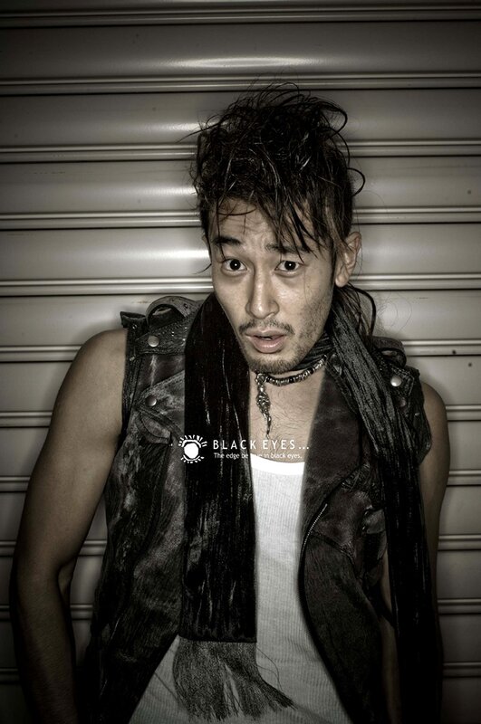man in leather vest