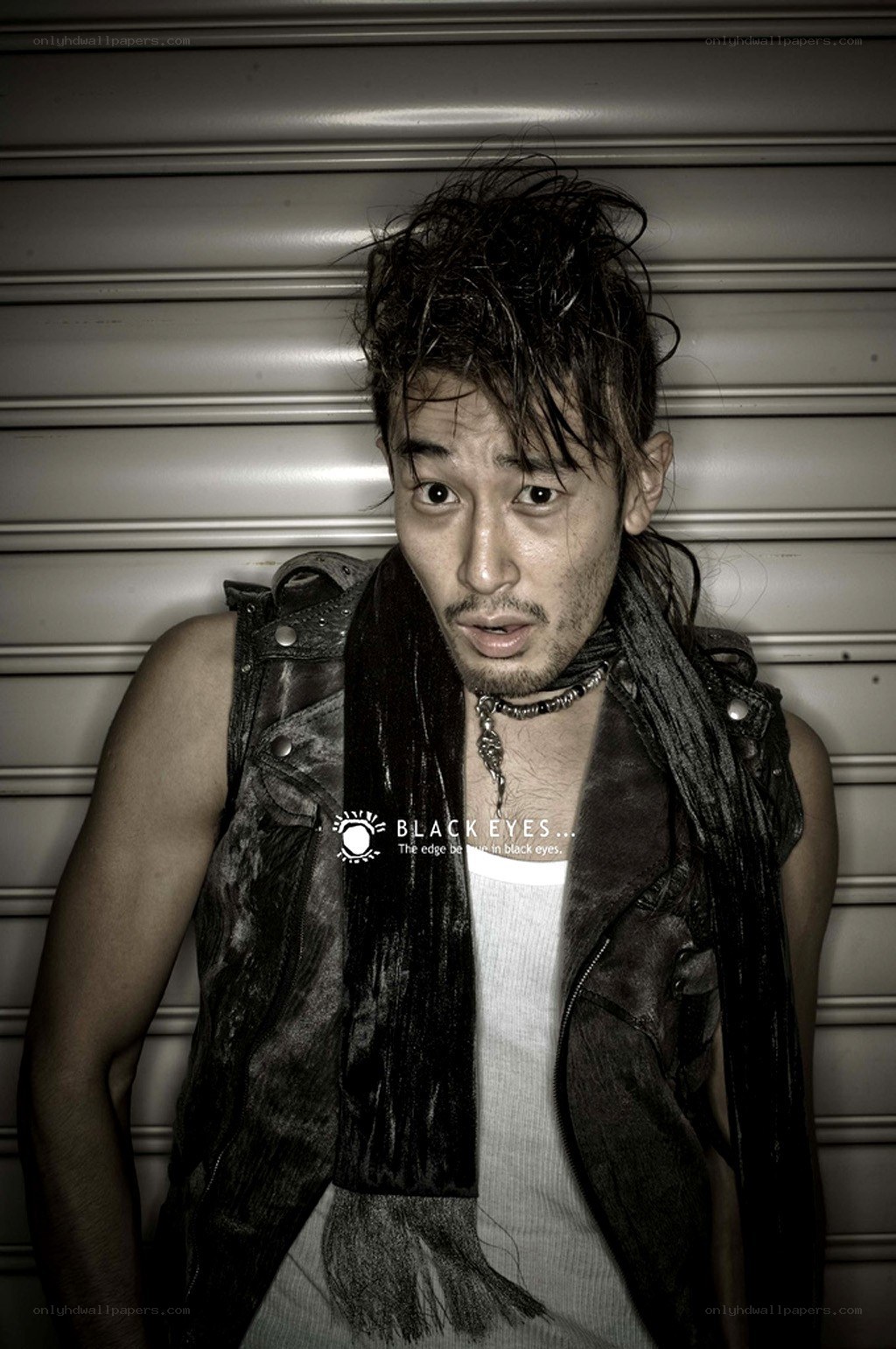 man in leather vest
