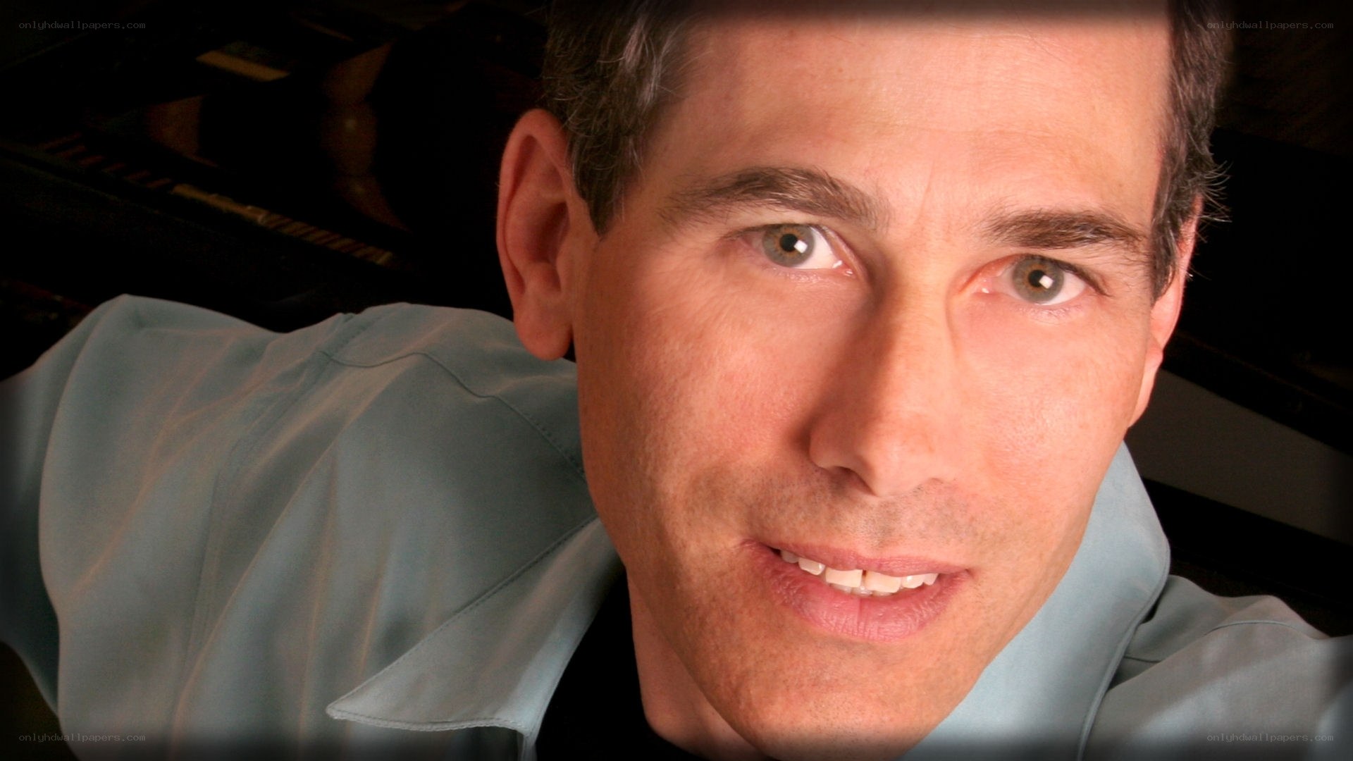 man in light blue shirt