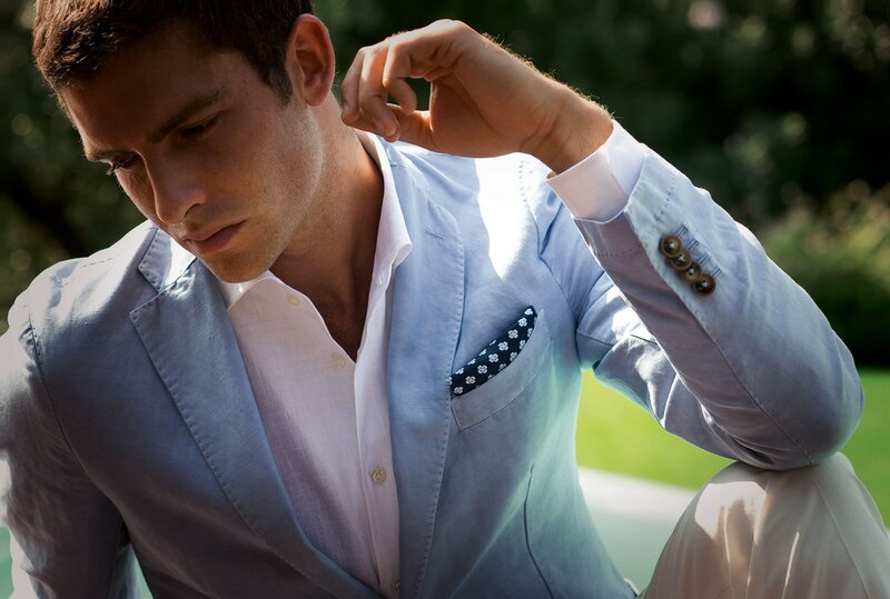 man in light blue suit