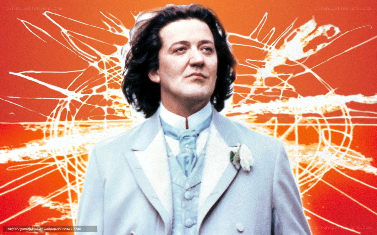 Man in light suit on orange background