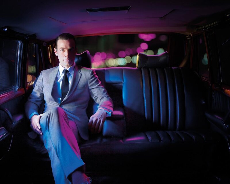 man in limo at night
