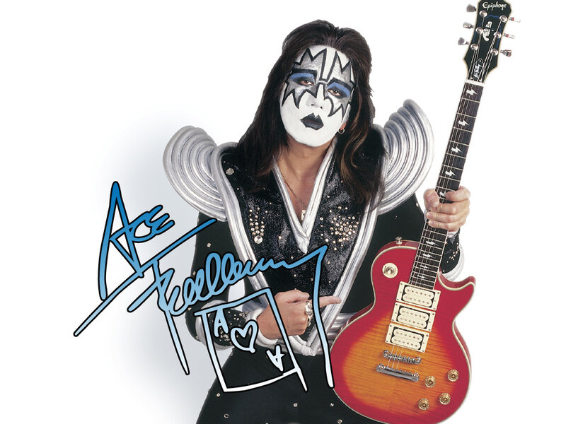 Man in Makeup Holding Guitar