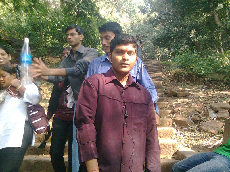 Man in Maroon Shirt — Outdoor