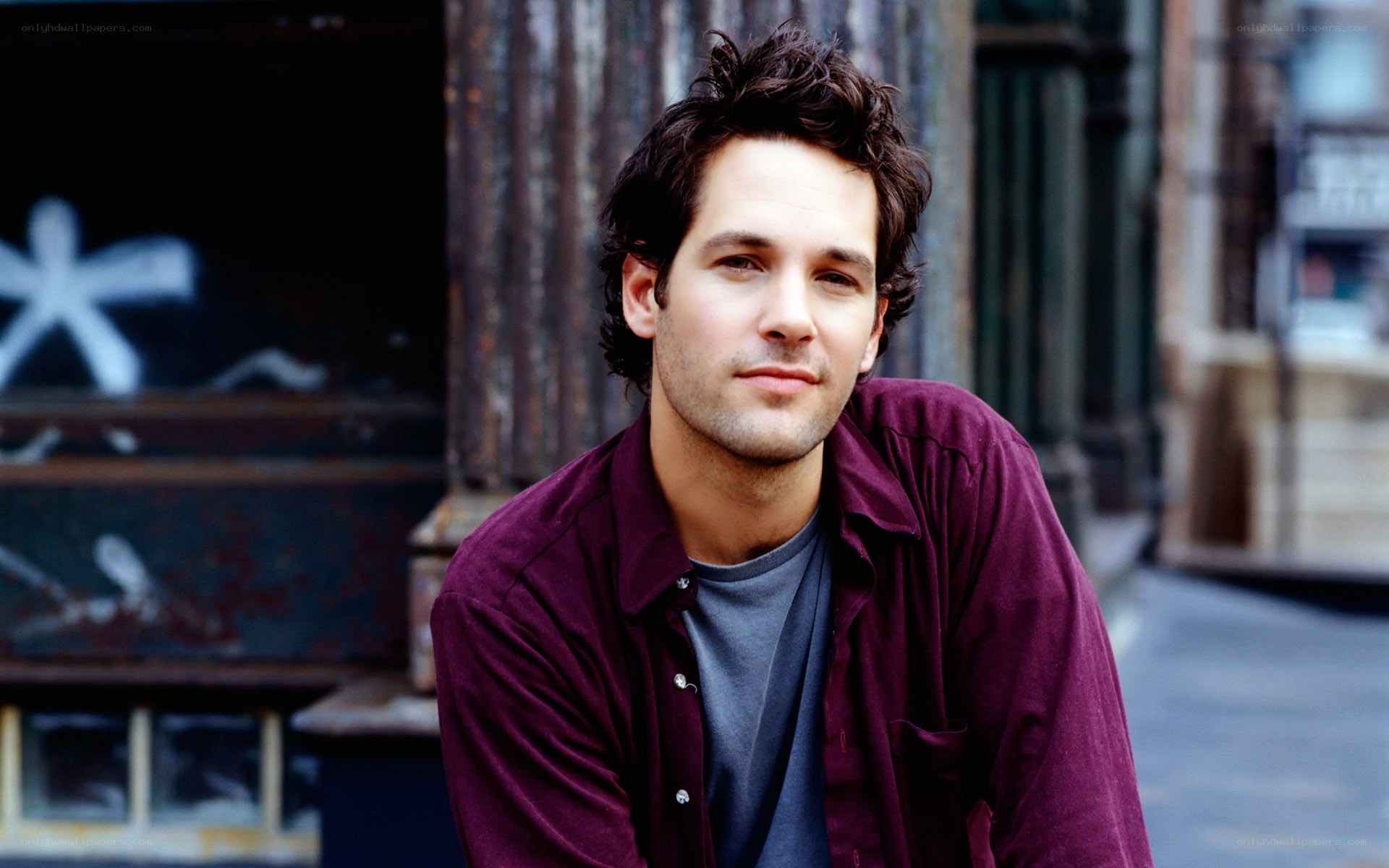 man in maroon shirt