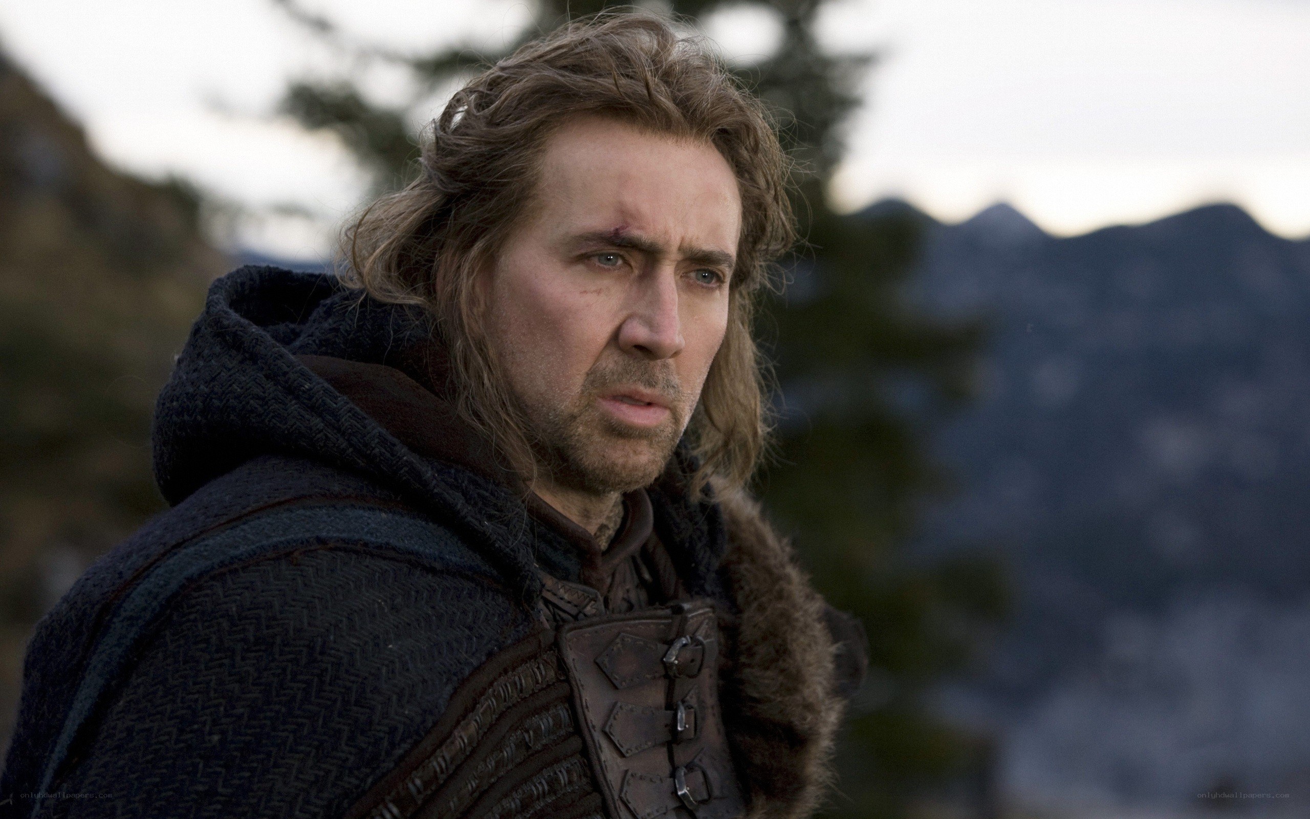 man in medieval cloak