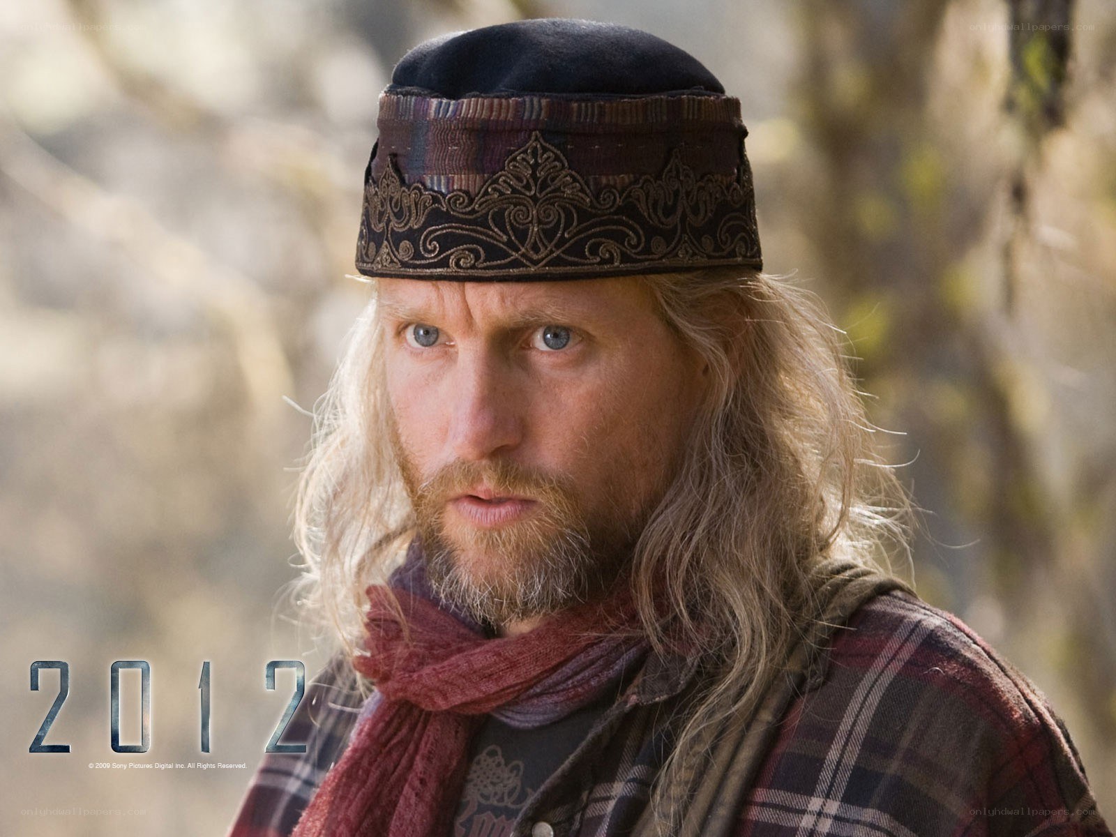 man in medieval hat and scarf
