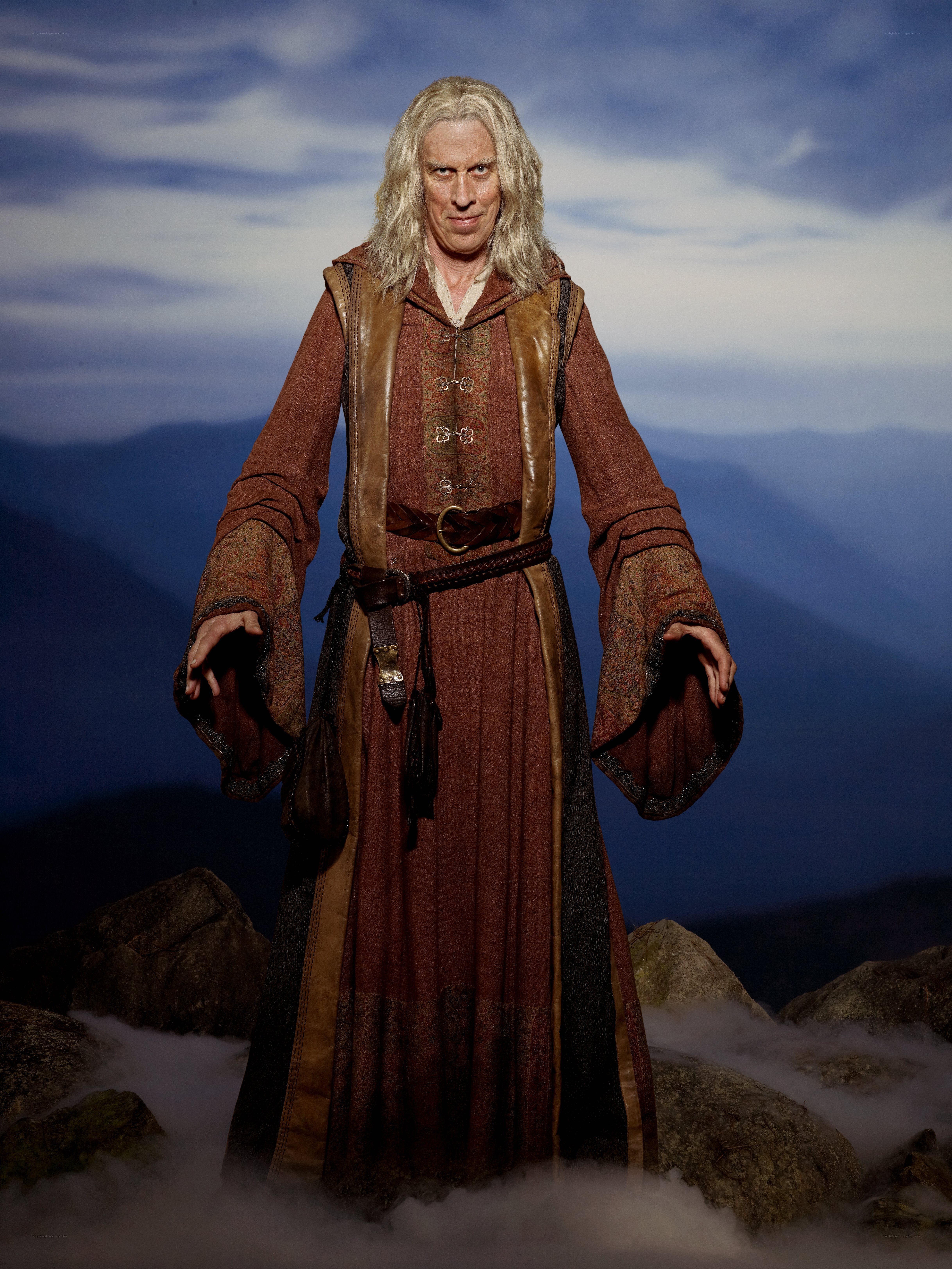 Man in medieval robe on mountain