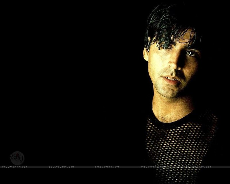 man in mesh shirt portrait