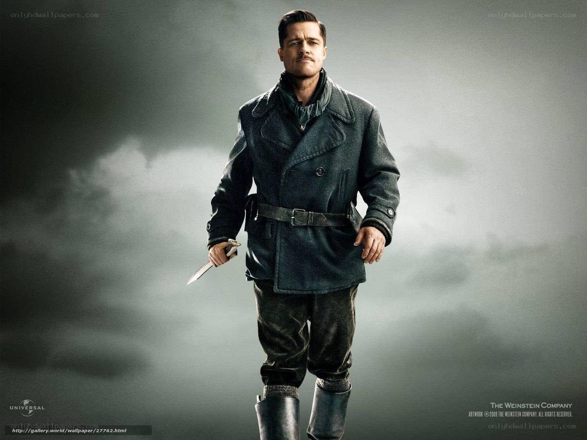 Man in military coat holding knife