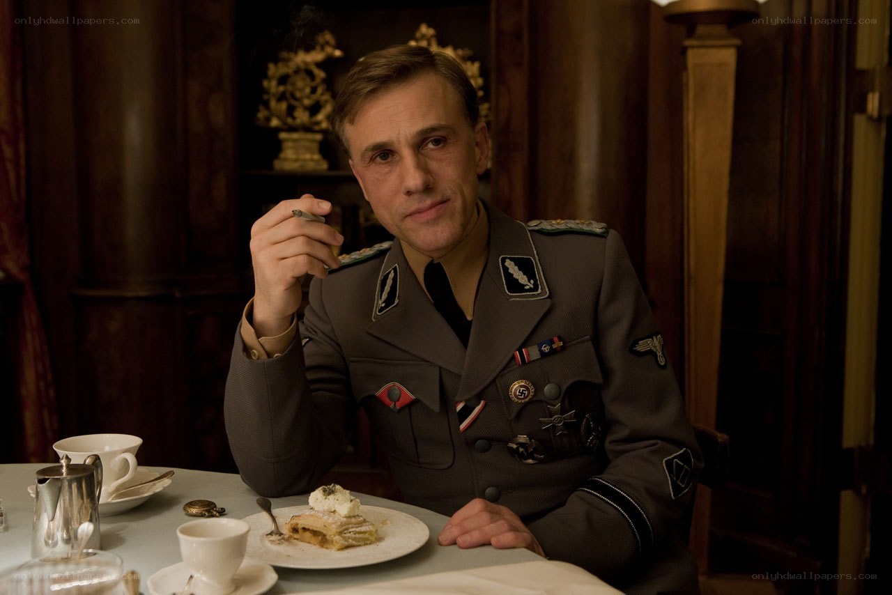 Man in military uniform at table