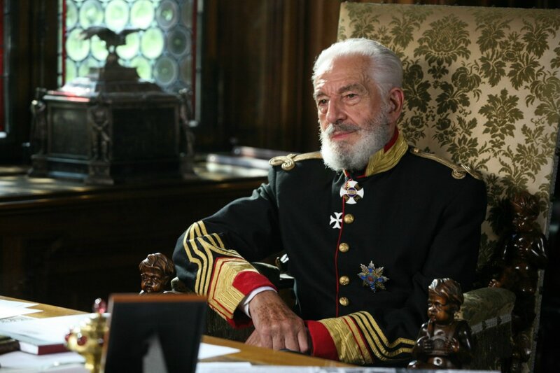 Man in Military Uniform — Black, Dramatic, Photograph, Desk