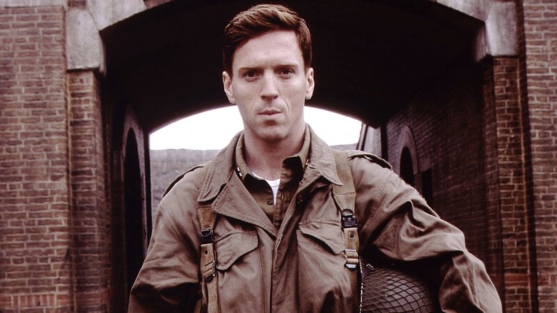 Man in Military Uniform — Brown, Serious, Photograph, Brick Archway