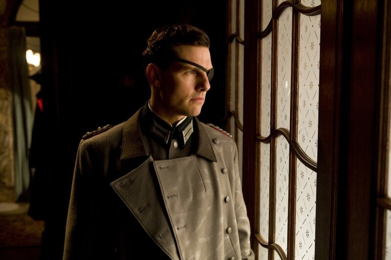 man in military uniform by window