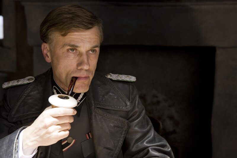 Man in military uniform smoking pipe
