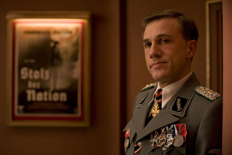 Man in military uniform with poster