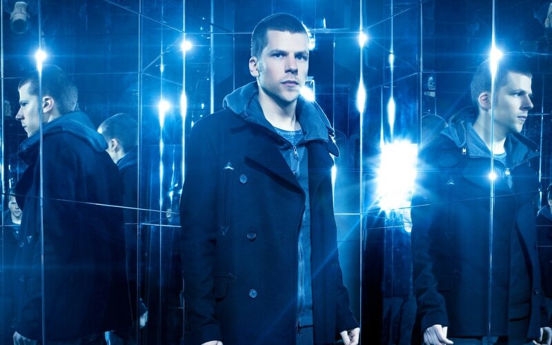 man in mirrored room