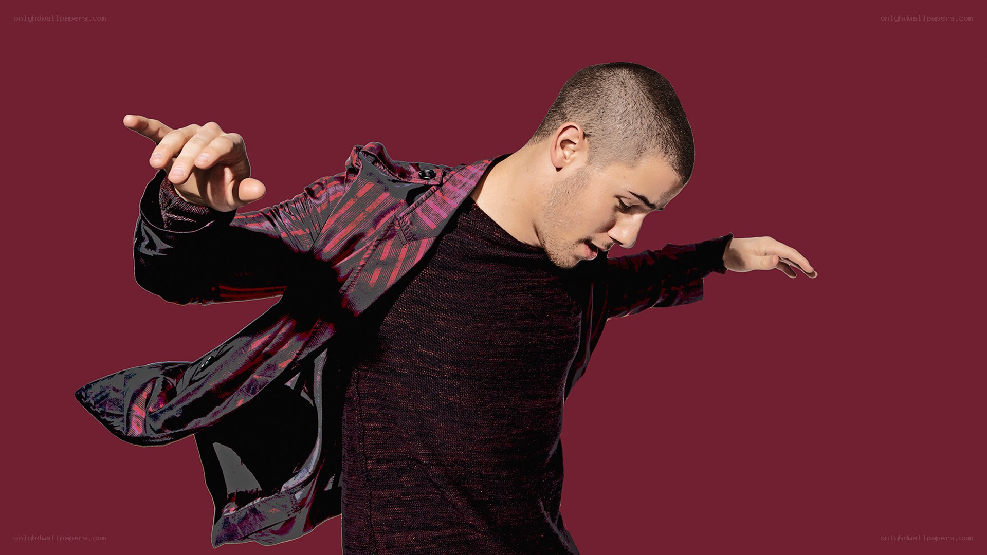 man in motion against red background