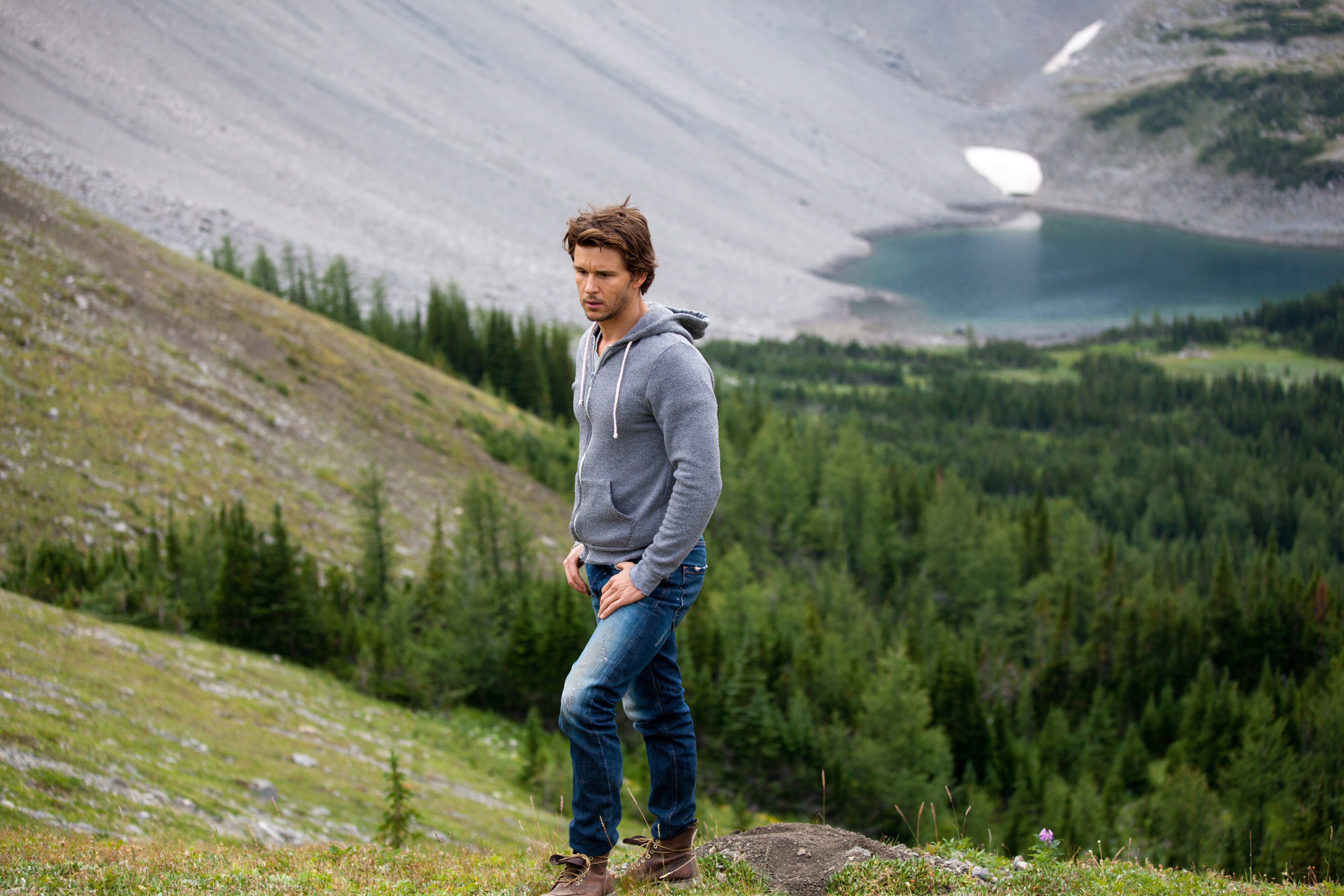 Man in mountains with lake