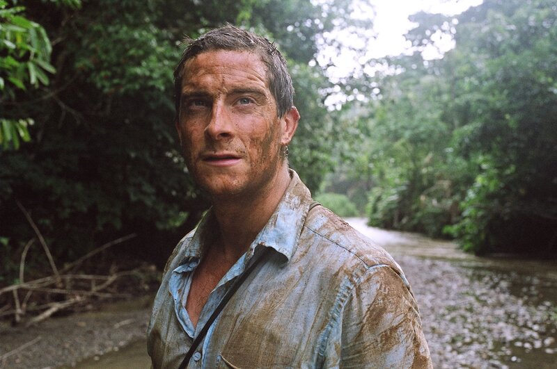 man in muddy jungle