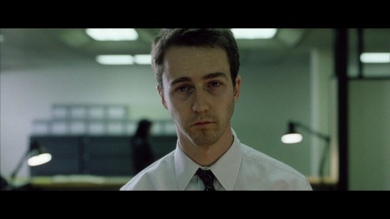 man in office looking at camera