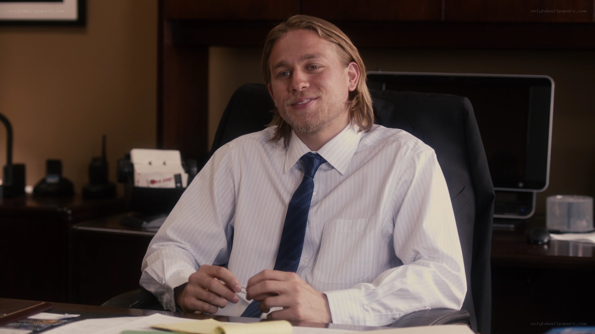 man in office smiling